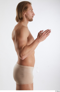 Erling  1 arm flexing nude side view 0004.jpg